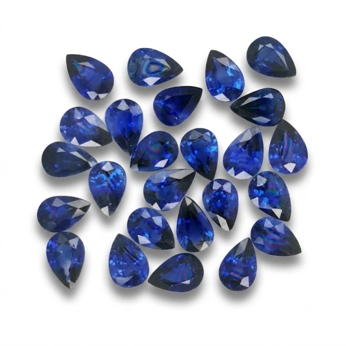 A gemstone parcel of blue pear shaped sapphires